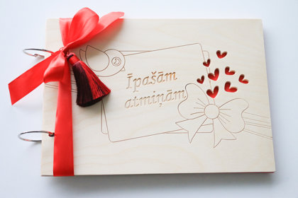 Foto albums ar putniņu uz vāka