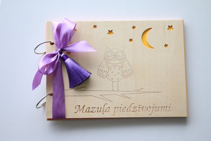 Foto albums ar pūci uz vāka